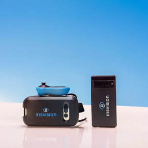 Photo of the Iris Vision Headset with the Dongle and Phone beside it. 