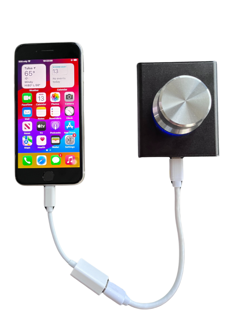 image of an iphone on the left and the nanonob on the right connected via the provided cable