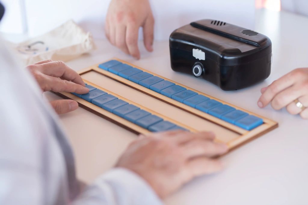 two people with their hands on the breye dominoes