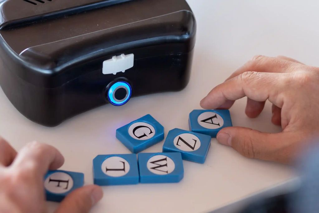 breye dominoes on a table with the letters showing